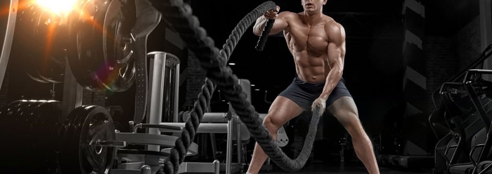 Guy working out with ropes